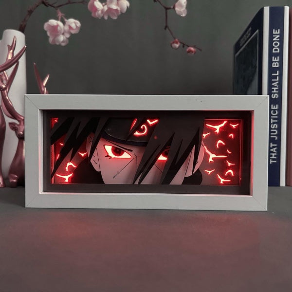 Caja de luz del joven Itachi